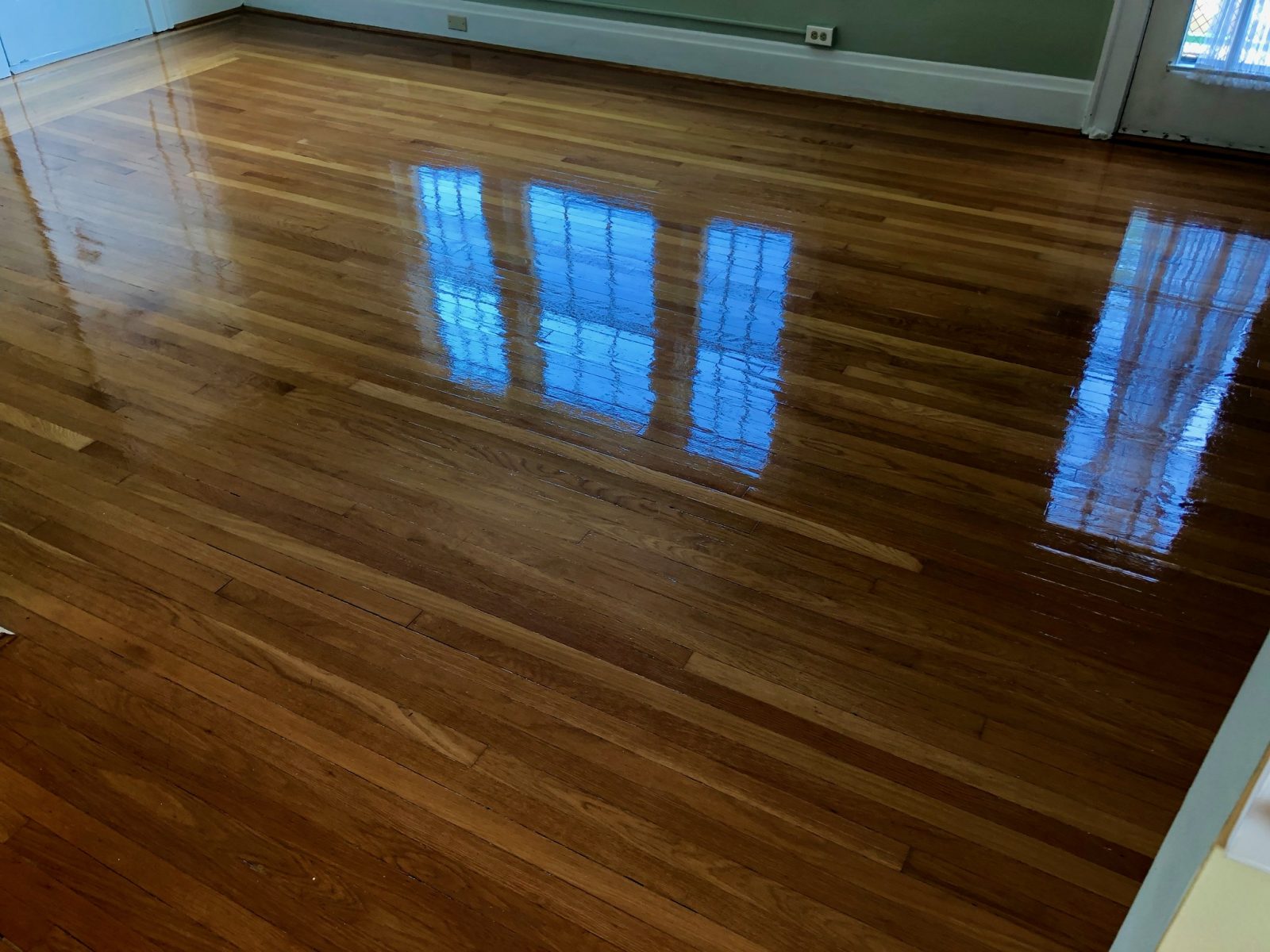 Professional Hardwood Floor Cleaning Blue Ash Ohio by Howards Cleaning Service